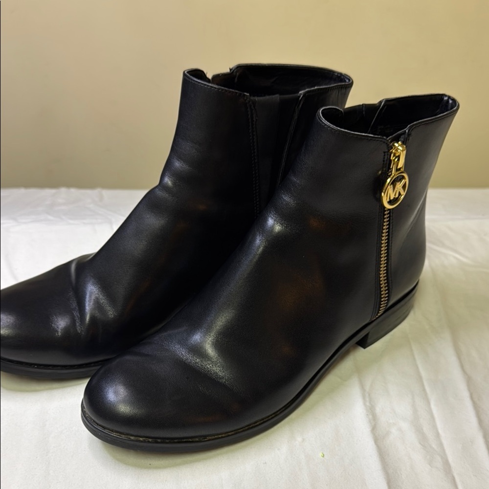 Michael Kors Black and‎ Gold Ankle Booties with Streamlined Silhouette
